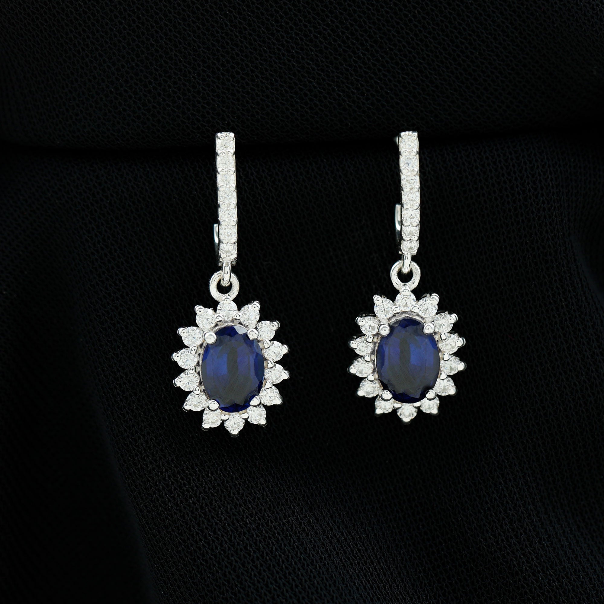 Oval Created Blue Sapphire Silver J Hoop Earrings with Moissanite Halo - Rosec Jewels