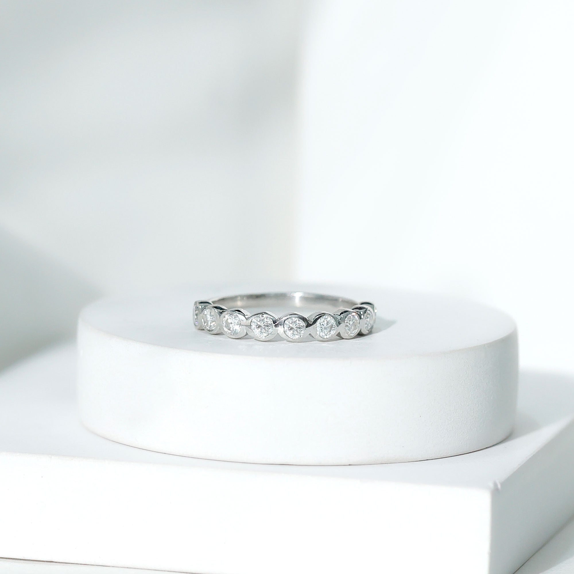 Rosec Jewels-Bezel Set Moissanite Half Eternity Band Ring